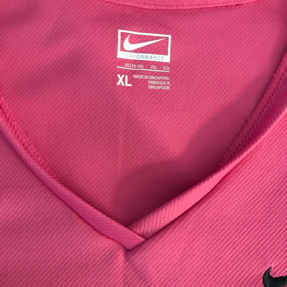 Women’s top fits like a large